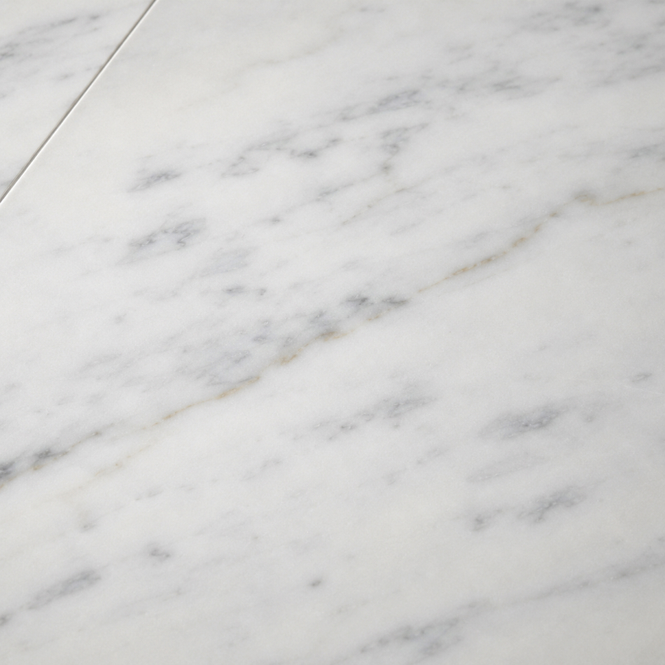 Preview: Nahaufnahme von Bianco Carrara Marmor mit natürlicher grauer Aderung